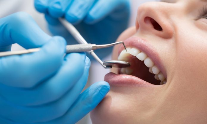 cropped-dentist_teeth_1