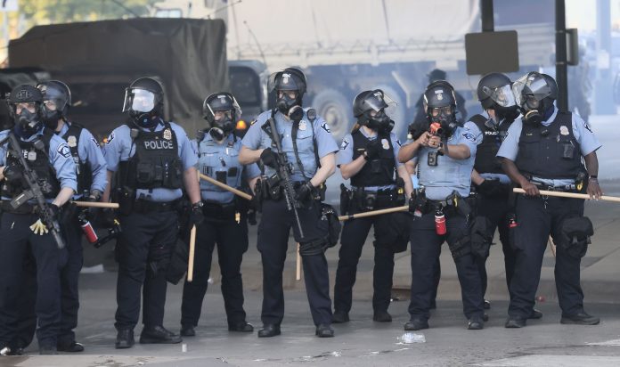 Police abuse protest in wake of George Floyd death in Minneapolis, USA - 29 May 2020