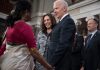 Joe- Biden shake hands with Indian woman