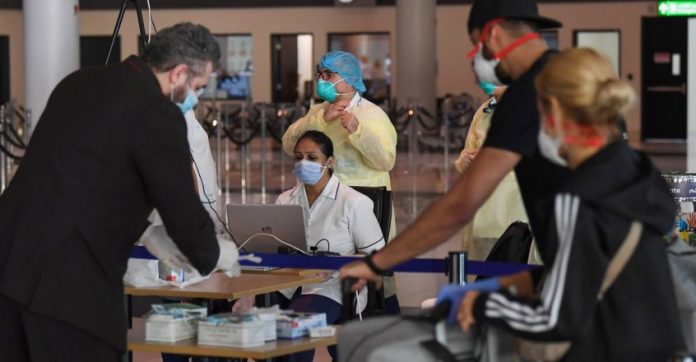 COVID-19-coronavirus-uae-airport.jpg.image.845.440