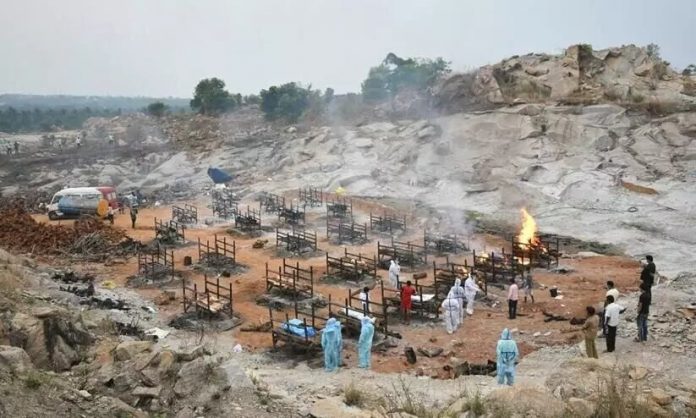 1000191-bengaluru-crematoriums-running-out-of-space-pyres-burn-at-granite-quarry-outside-city