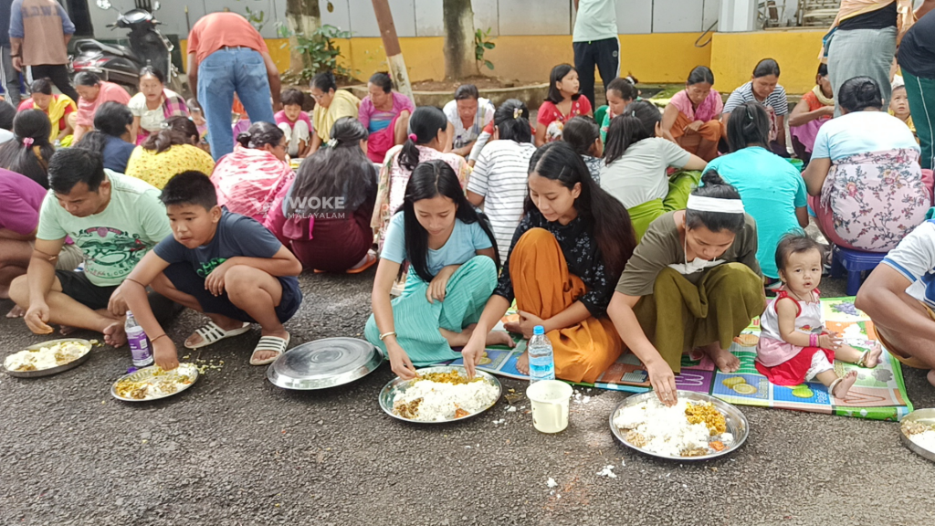 having food meitei inmates in bishnupur relief camp